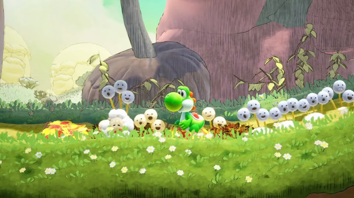 Yoshi exploring a colourful grassy meadow in Yoshi and the Mysterious Book for Nintendo Switch 2